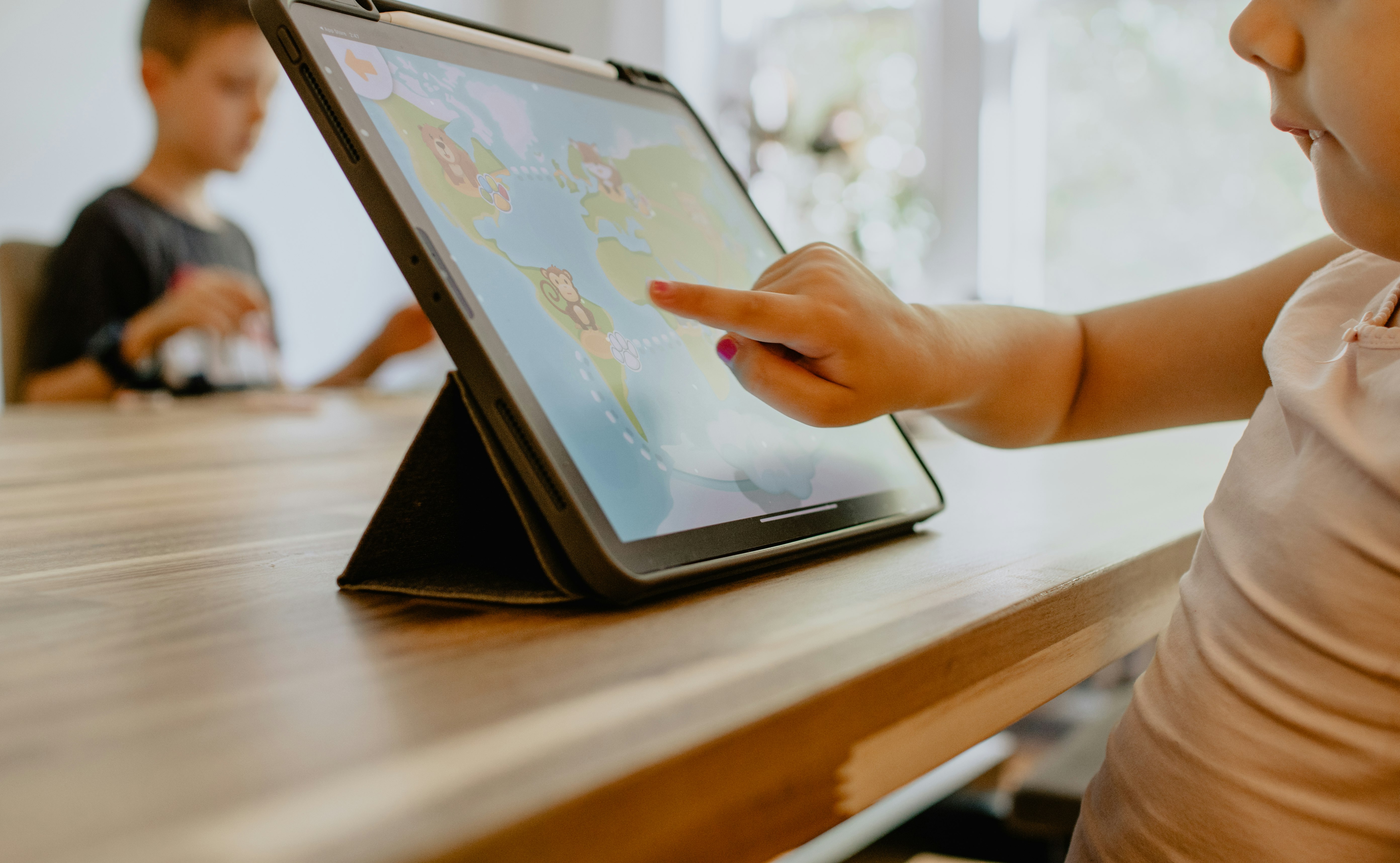 person using white tablet computer